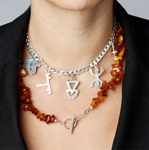 
                
                    Load image into Gallery viewer, Akal Amber Gri-gri Masterpiece Necklace
                
            